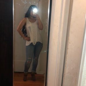 White sleeveless blouse